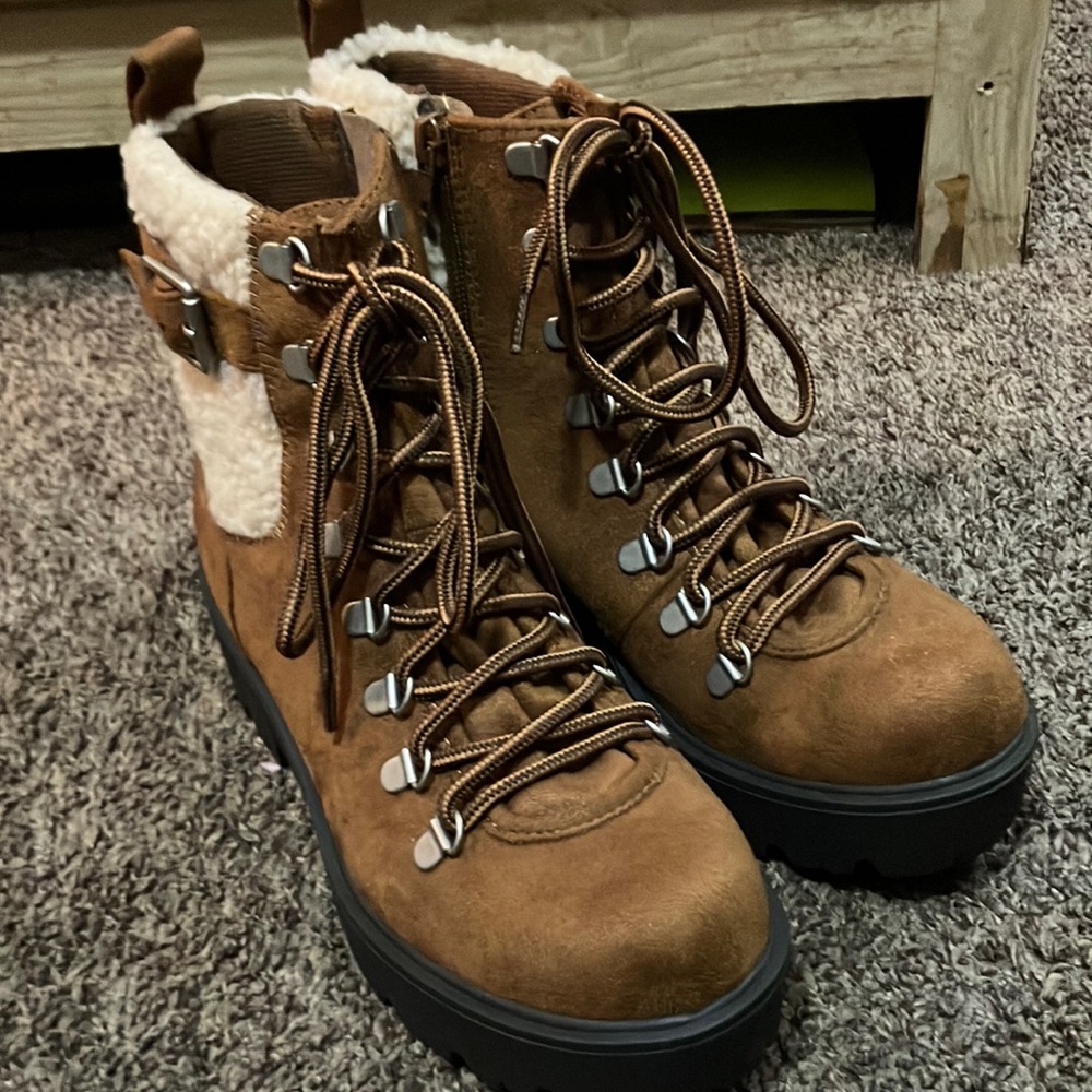 Soda is the brand they are dark brown hiking boots. Size 7M.